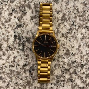Nixon gold and black sentry SS watch (men’s)